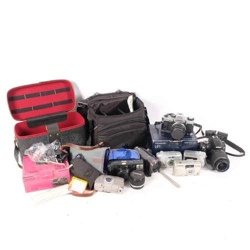 334 - A quantity of Vintage cameras and associated equipment, including a Kodak Advantix 400, A Fujifilm F... 