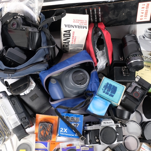 337 - A quantity of Vintage cameras and associated equipment, including a Nikon AFF-801S, a Sigma Super Wi... 