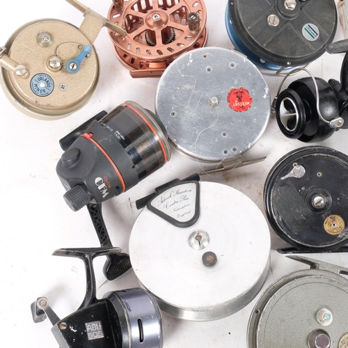 357 - A quantity of various Vintage fishing reels, spools, and other accessories, various brands including... 