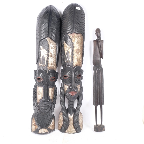 366 - 2 similar modern hardwood African Tribal masks/wall hangings, H104cm, and a modern hardwood African ... 