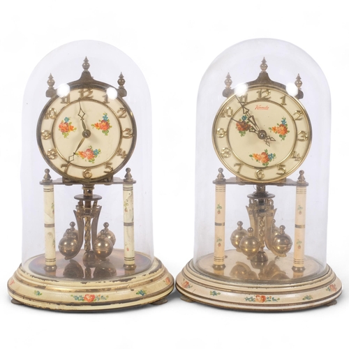 381 - A pair of ornate mantel clocks, under glass domes on wooden base, with intricate floral decoration, ... 