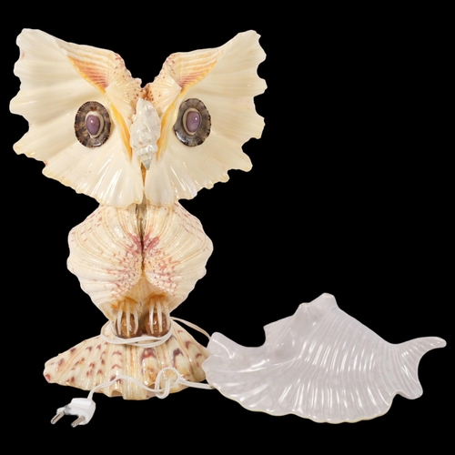 383 - A Poole Pottery seashell ceramic display, and an ornate table lamp in the form of an owl, made from ... 