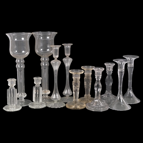 385 - 6 pairs of various glass candlesticks, largest pair overall height 35cm, all unmarked