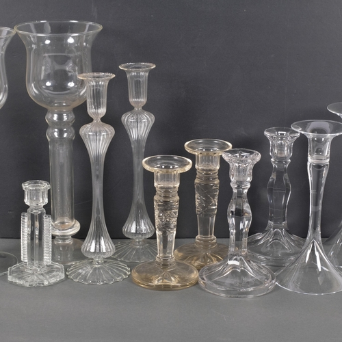 385 - 6 pairs of various glass candlesticks, largest pair overall height 35cm, all unmarked