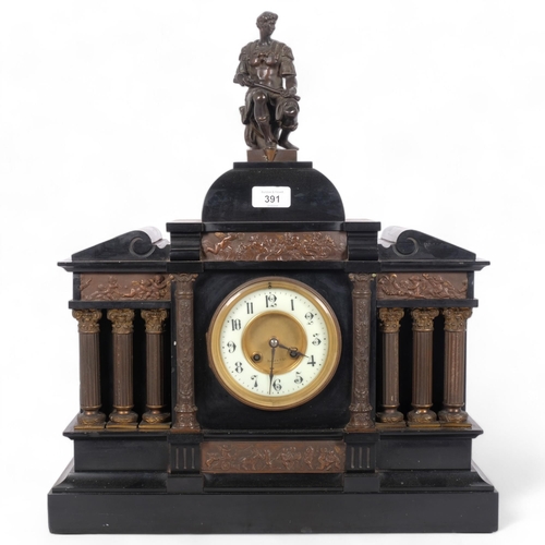 391 - An architectural design black slate-cased mantel clock, with Corinthian columns surmounted by a figu... 