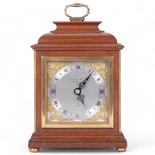 392 - GARRARD & COMPANY LTD LONDON - an Elliot mahogany-cased mantel clock, height not including handle 19... 