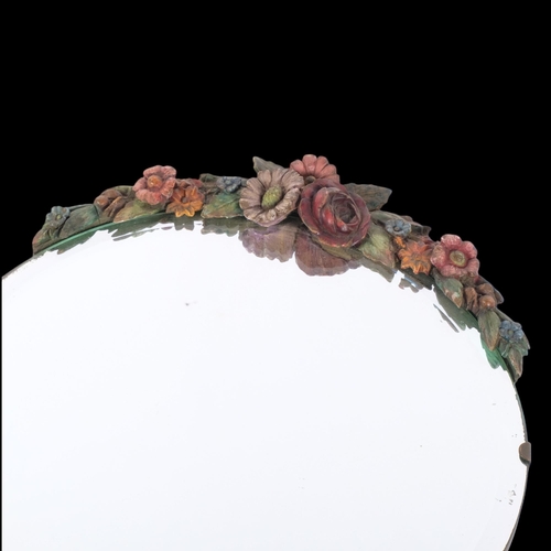 413 - An early 20th century circular bevel-edged Barbola mirror, with applied painted gesso floral decorat... 