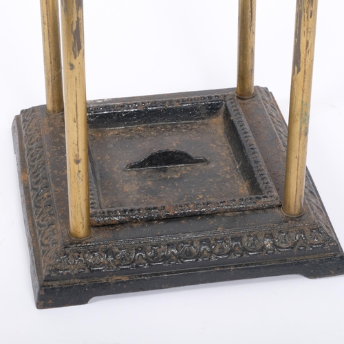 6 - A Victorian brass and cast-iron 4-section stick stand, H62cm