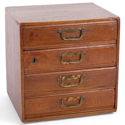 83 - An early 20th century desk-top filing chest of 4 short drawers, 31cm x 31cm x 26cm