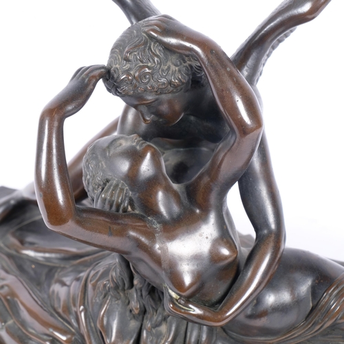 86 - A cast-bronze study of Cupid and Psyche, mounted on a green marble base of demi-lune form, H40cm