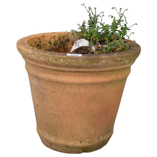 2806 - A weathered circular terracotta plant pot. 37x31cm.