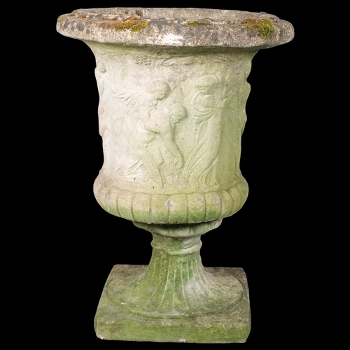 2812 - A weathered concrete Grecian design two-section garden urn. 64x85cm.