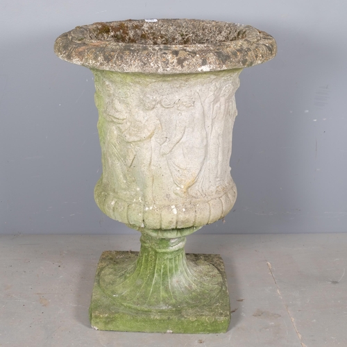 2812 - A weathered concrete Grecian design two-section garden urn. 64x85cm.