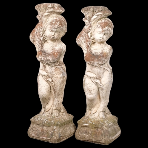 2816 - A pair of stone cherub garden statues. Height 79cm.