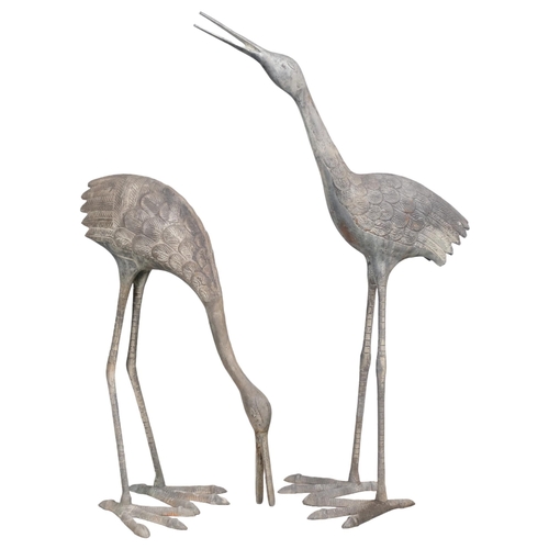 2824 - Two similar bronze sculptures of young cranes. Tallest 76cm.