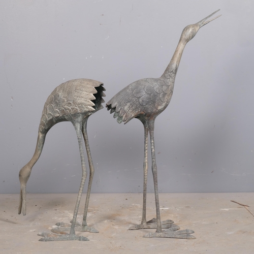 2824 - Two similar bronze sculptures of young cranes. Tallest 76cm.