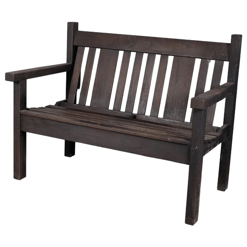 2835 - A stained pine garden bench. Overall 111x86x62cm, seat 99x40x40cm.