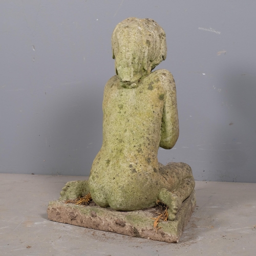 2838 - A weathered concrete garden statue, study of nude female on plinth base. Height 54cm.