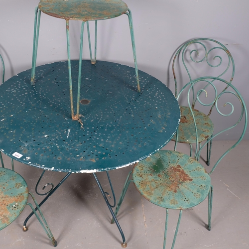 2841 - A painted metal circular topped garden table, 97x74cm, with five matching stacking chairs.