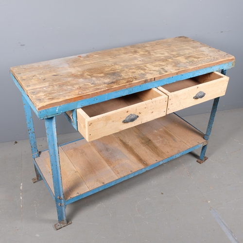 2849 - A pine and painted metal framed two-tier work bench with two frieze drawers. 130x89x50cm.