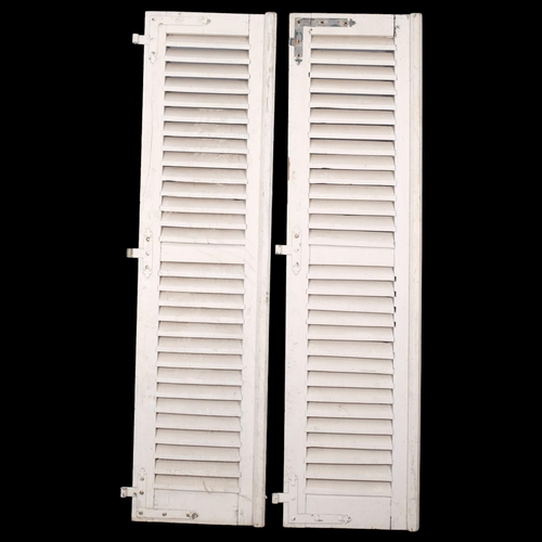 2862 - Two painted wooden shutters. Each (including hinge) 56x203cm.