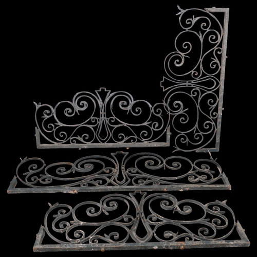 2864 - Four Art-Deco design wrought iron fence panels. Largest 183x59cm, smaller three 137x59cm.