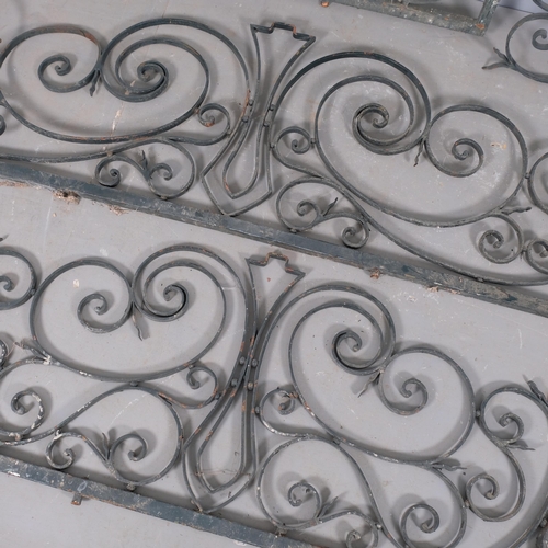 2864 - Four Art-Deco design wrought iron fence panels. Largest 183x59cm, smaller three 137x59cm.