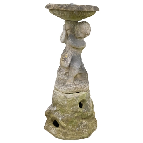 2878 - A weathered concrete three-section water feature, with bowl  on figural support and plinth base. Hei... 