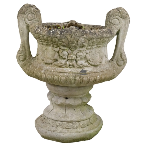 2879 - A weathered concrete two-section garden tazza urn. 49x60x38cm.