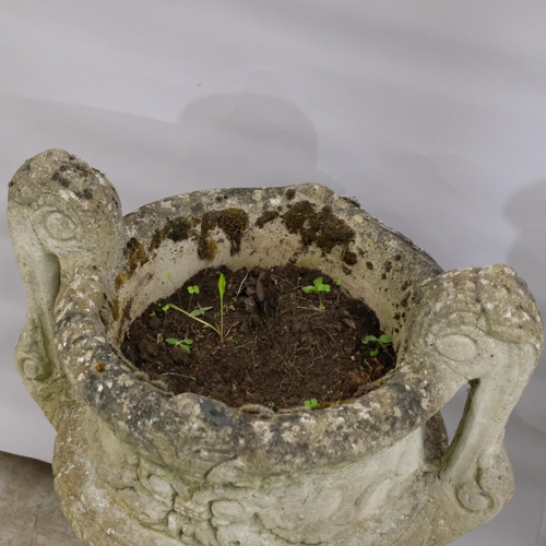 2879 - A weathered concrete two-section garden tazza urn. 49x60x38cm.