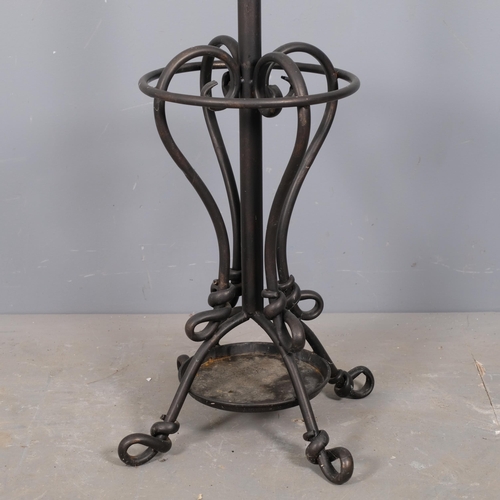 2886 - A painted wrought-metal hat and coat stand. Height 190cm.