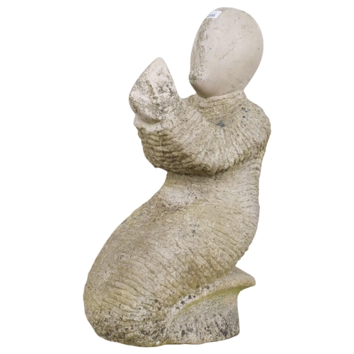 2895 - A large carved white opal sculpture, study of a praying figure. Height 66cm.