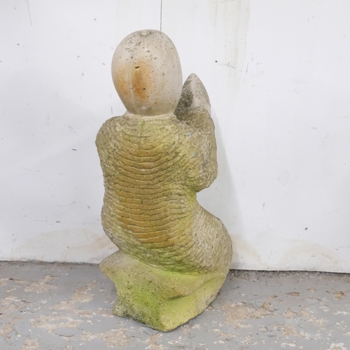 2895 - A large carved white opal sculpture, study of a praying figure. Height 66cm.