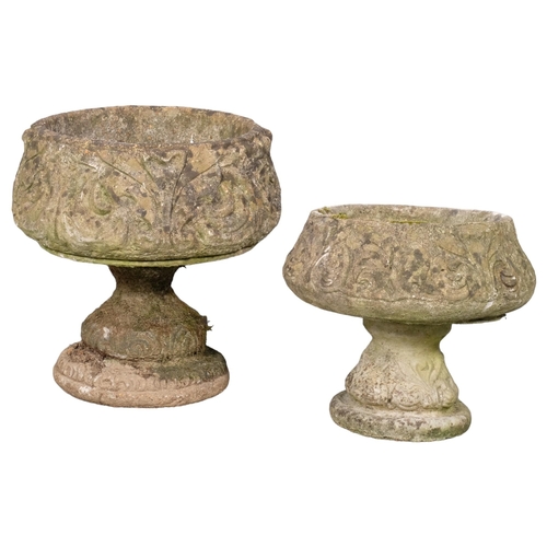 2899 - Two similar two-section garden urns on stands. Largest 43x46cm.