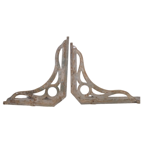 2908 - A pair of extra-large and impressive Victorian cast iron railway station canopy brackets. 120x105cm.... 