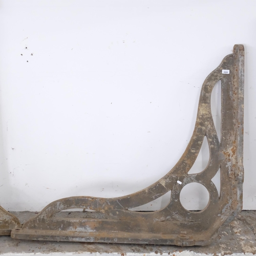 2909 - A pair of extra-large and impressive Victorian cast iron railway station canopy brackets. 120x105cm.