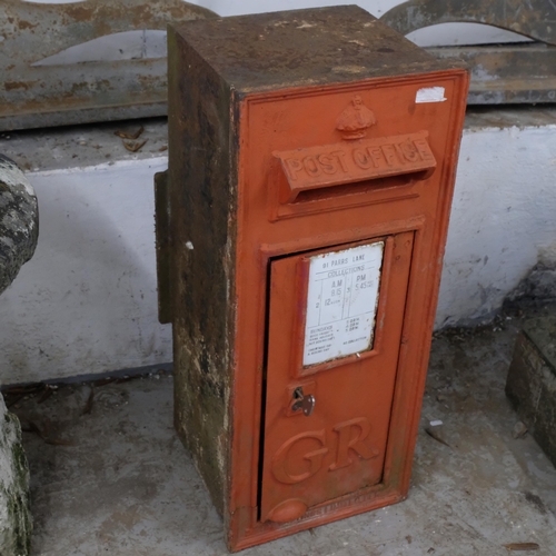 2913 - A Georgian cast iron Royal Mail post box, with enamel panel for 91 Parrs Lane. Overall 35x84x38cm.