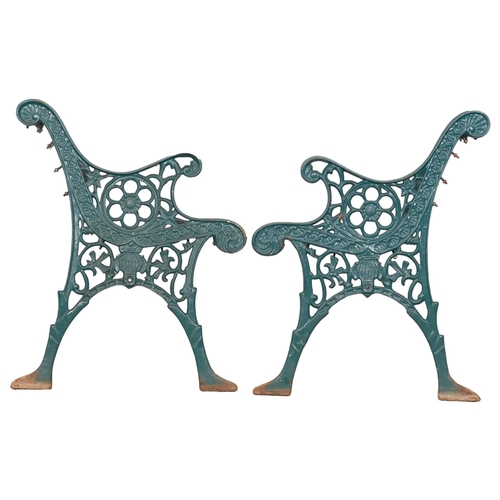 2919 - A pair of painted cast iron bench ends. Height overall 72cm.