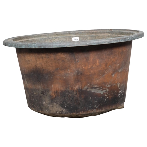 2920 - A copper planter, with pierced rounded base. 73x43cm.