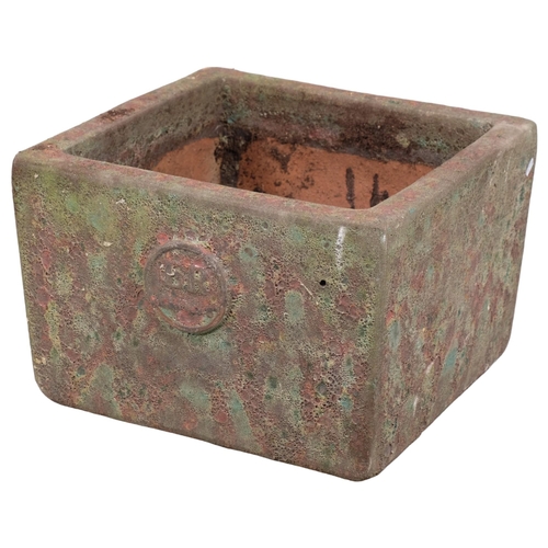 2926 - A square crackle-glazed terracotta planter, with impressed crest initialled LR to front. 47x32cm.