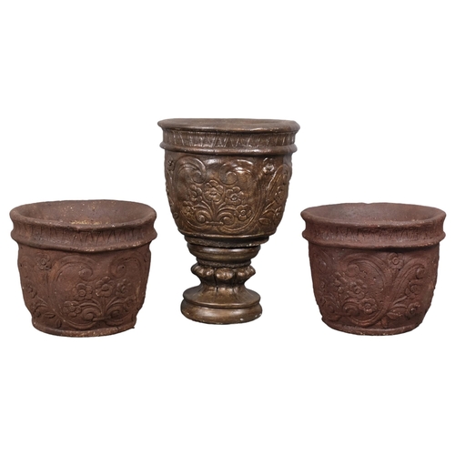 2931 - A two section concrete garden urn on stand, 43x57, and two similar concrete garden urns. (3)