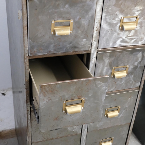 2934 - A brushed metal ten-drawer filing cabinet. 55x132x54cm.