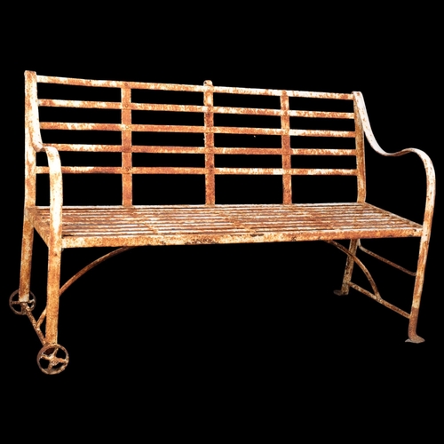 2939 - A painted wrought iron garden bench. 153x95x65cm