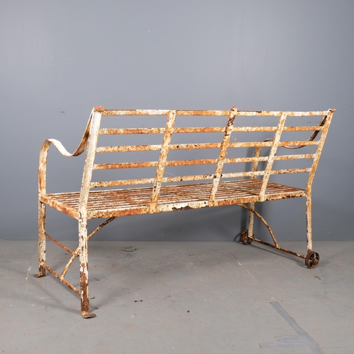 2939 - A painted wrought iron garden bench. 153x95x65cm