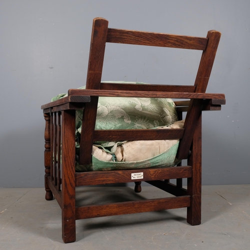 2954 - A teak-framed Plantation chair, with upholstered seat cushions.