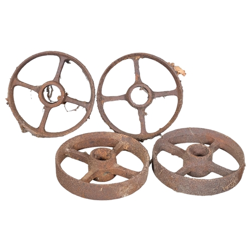 2959 - Four antique cast-iron shepherd's hut wheels. Diameter - 33cm.