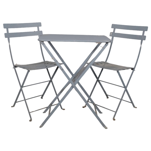 2966 - A grey-painted folding bistro set, comprising a rectangular folding table, 57x74x37cm, and two match... 