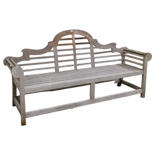 2971 - A teak Lutjens style garden bench. Overall 210x106x60cm.