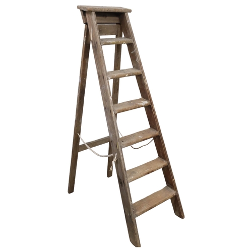 2974 - A vintage folding step-ladder. Height 155cm.