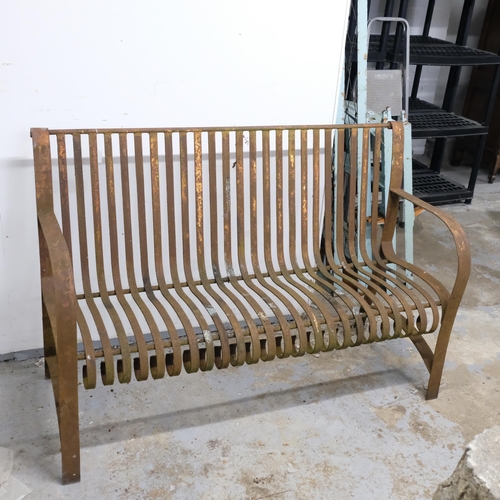 2977 - An antique wrought iron strapwork garden bench. 132x89x52cm.